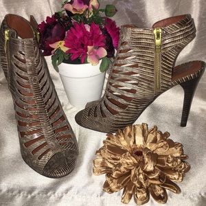 Vince Camuto brown/tan stiletto ankle bootie.